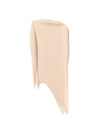 A smooth swipe of neutral-toned serum foundation on a white background.